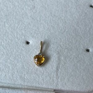 9k gold yellow sapphire pendant